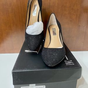 Black elegant Pumps w/ rhinestone worn only once.